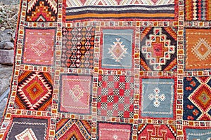 Imlil, Morocco - Fenb 22, 2023: Traditional Berber rugs and carpets on sale in the High Altas Mountains