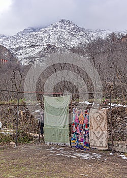 Imlil, Morocco - Fenb 22, 2023: Traditional Berber rugs and carpets on sale in the High Altas Mountains