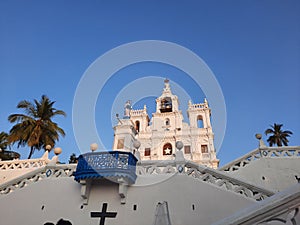 Immaculate Conception Church in Panjim. panjim church. goa church. white church and blue sky.