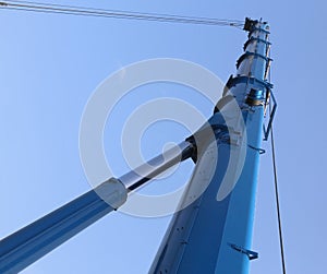 Immense hydraulic arm of a powerful crane