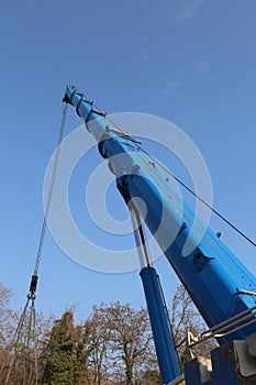 Immense hydraulic arm of a powerful crane