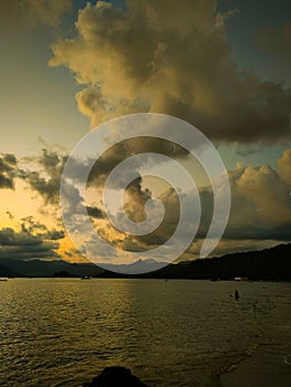 Magical Moments: Capturing the Beauty of Beach Sunsets and Diverse Silhouettes photo