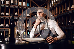 Immersed alcohol critic fixedly gazing at wine