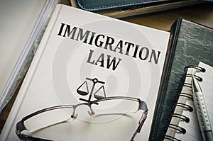 Immigration law book. Legislation and justice concept