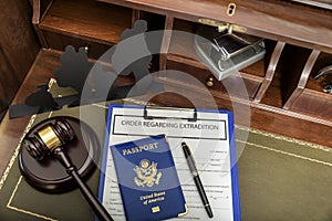 Immigration law concept. Gavel, passport and Silhouette of immigrants on wooden table.