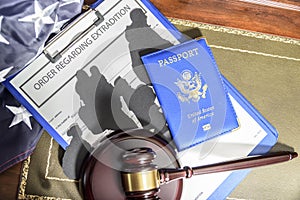 Immigration law concept. Gavel, passport and Silhouette of immigrants on wooden table.