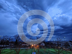 Imminent storm forming bewildering cloud patterns in the evening skies, in Freiburg, Germany