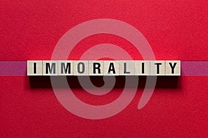 Immorality word concept on cubes