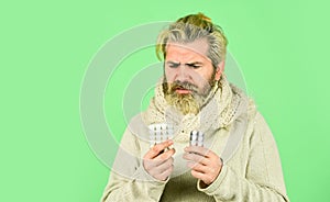 Immune system fight infections. Bacteria invades body. Virus treatment. Bearded hipster messy hairstyle. Sick man hold photo