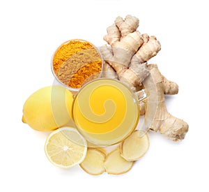 Immunity boosting drink with ginger, lemon and turmeric on white background, top view