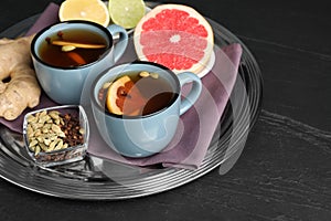 Immunity boosting drink and ingredients on black table