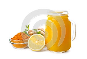 Immunity boosting drink with lemon, ginger and turmeric on white background