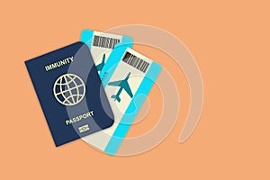 Immunity passport, and air tickets on an orange background. For work and travel, people vaccinated or recovered from COVID-19.