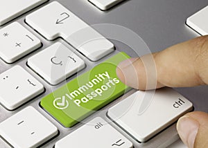 Immunity passports - Inscription on Green Keyboard Key photo