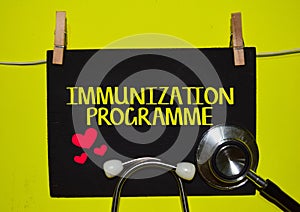 IMMUNIZATION PROGRAMME on top of yellow background