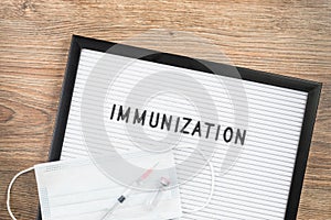 Immunization term and syringe. medical concept