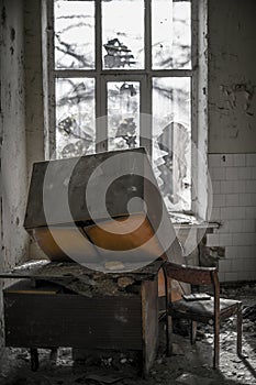 Impact of destruction in danger war zone in Syria empty abandoned place room with demolition furniture and broken window