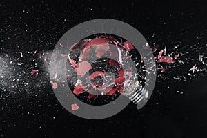 Impact explosion of a red light bulb