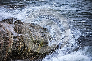 Impact of large waves against rocks