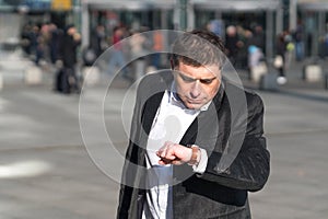 Impatient man at the bus station