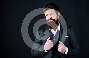 Impeccable style. Businessman fashionable outfit black background. Man bearded guy wear suit outfit. Perfect elegant