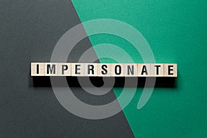 Impersonate - word concept on cubes