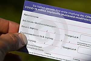 Vaccination pass and confirmation for corona vaccination with vaccine from Biontech Pfizer in Austria photo