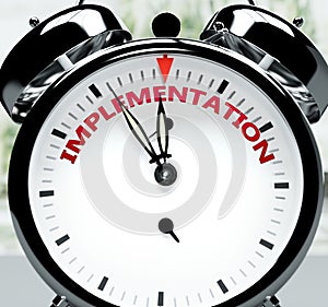Implementation soon, almost there, in short time - a clock symbolizes a reminder that Implementation is near, will happen and