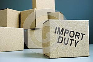 Import duty concept. Pile of cardboard boxes