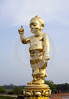 The important baby Buddha gold statue.