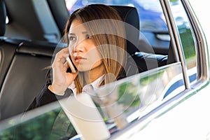 Important businesswoman in a car