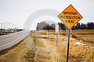 Important intersection ahead sign photo