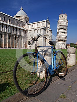 bicycle in front of the famous Leaning Tower of Pisa in Tuscany, Italy