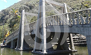 Imposing bridge in a natural park photo