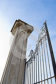 Imposing old gate column photo