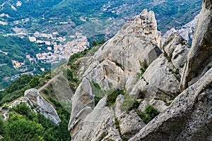 Imposing rocks of the Dolomiti Lucane mountain range with the vi photo