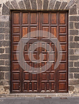 Imposing wooden doors entry photo