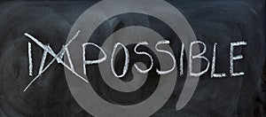 impossible handwritten on blackboard