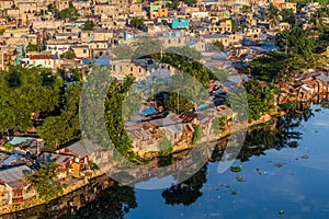 Impoverished areas along Ozama river in Santo Domingo, capital of Dominican Republi photo