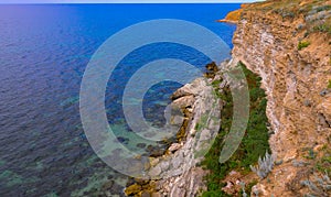 An impregnable precipitous rocky shore in the eastern Crimea