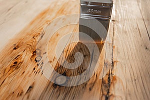 Impregnation of a wood with protective oil.Protecting the wooden surface from damage