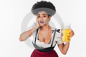 impressed african american oktoberfest waitress holding photo