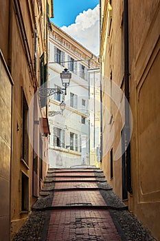 Impression of the narrow street Salita Sapia Petronilla in the center of the Italian town San Remo