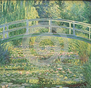 Impressionist painting of bridge over waterlilies by french painter Claude Monet