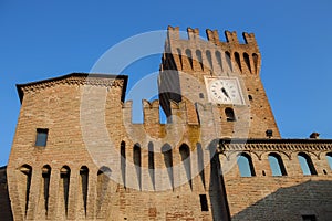 Impressive ancient fortress with clock tower in Spilamberto