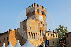 Impressive ancient fortress with clock tower in Spilamberto