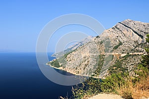 The impressive Biokovo mountains touching the sea near Baska Voda, Croatia