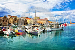 Travel in Greece - beautiful pier of old town Chania in Crete is photo