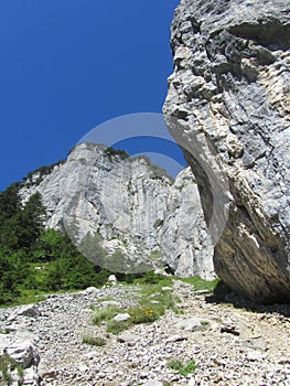 Impressive limestone rock formations in the alps photo