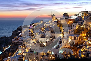 Impressive evening view of Santorini island. Picturesque sunset on the famous Greek resort Oia, Greece, Europe.